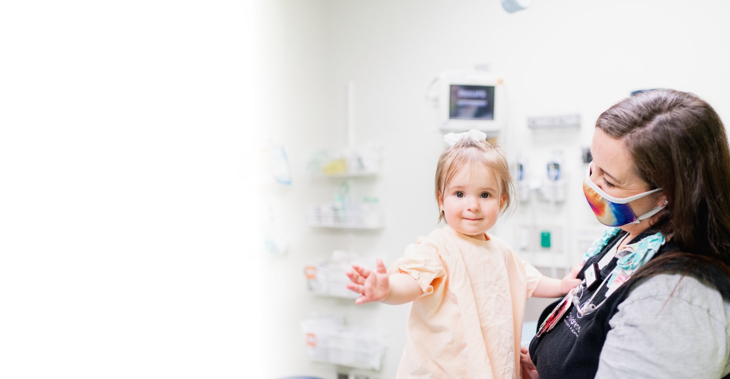 Allied health professional with child